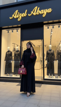 Model wearing Aizel Signature abaya with crimson embroidery - Aizel Abaya