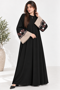 Black abaya full-length pose with matching floral kangoora embroidered cuffs
