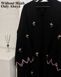 Black abaya with pink floral embroidery and scalloped cutwork detail
