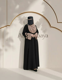 Model wearing emerald-black two-tone sleeve abaya - Aizel Abaya